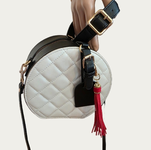 unbranded Handbags - Chic White Quilted Vegan Leather Round Bag with Red Tassel